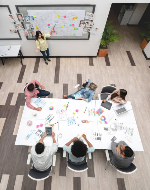 Business woman making a presentation at a creative office