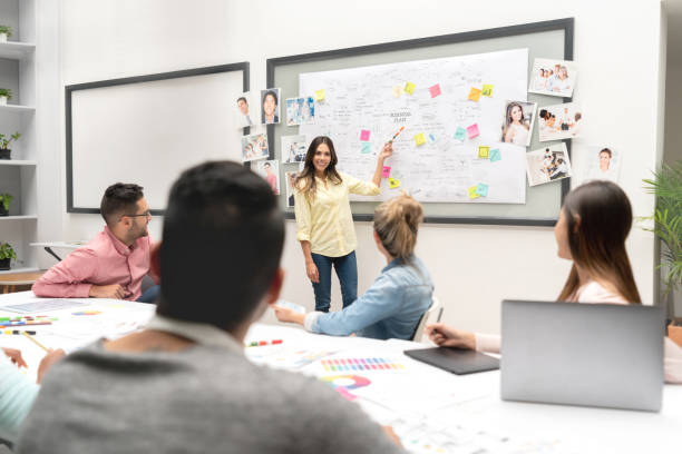 istock Business woman making a presentation at a creative office 1021334518