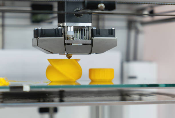 Close-up on a 3D printer printing a prototype Close-up on a 3D printer printing a prototype - technology concepts prototype photos stock pictures, royalty-free photos & images