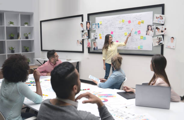 istock Business woman making a presentation at a creative office 1021334608