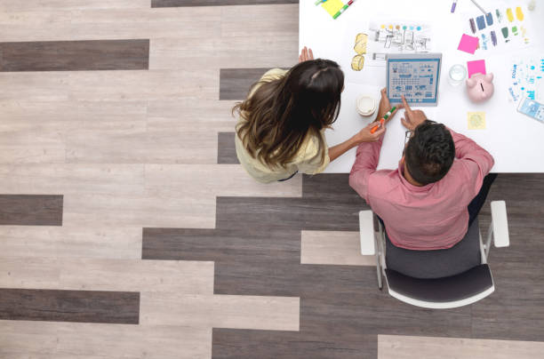 istock Business people sharing ideas at a creative office 1021336882