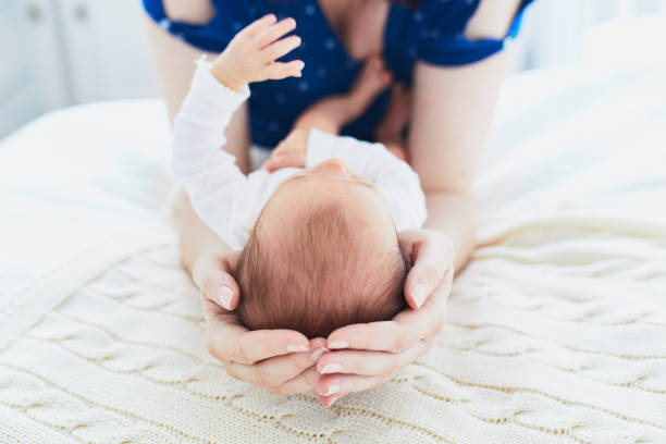 istock Mother bonding with her newborn baby 1021356754