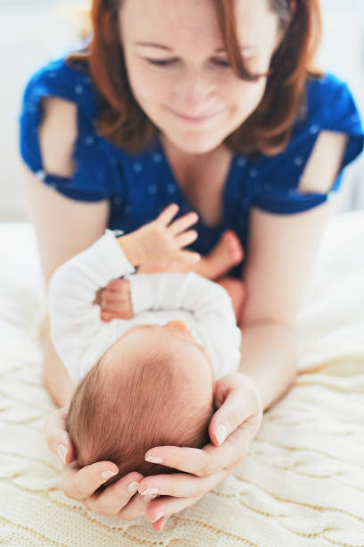 istock Mother bonding with her newborn baby 1021356768
