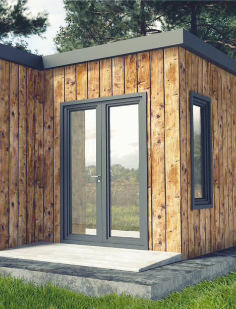 istock Small Modern Wooden House Exterior 1021365218