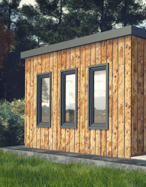 istock Small Modern Wooden House Exterior 1021365246