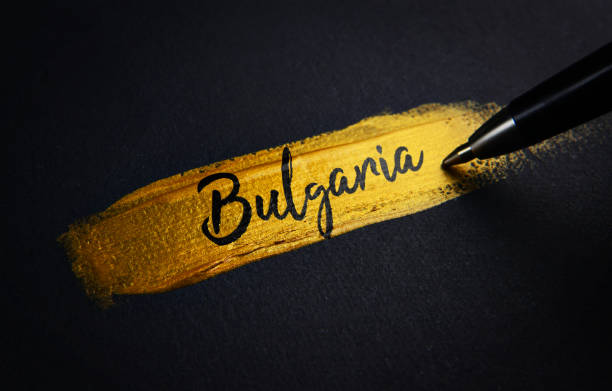 istock Bulgaria Handwriting Text on Golden Paint Brush Stroke 1021377720