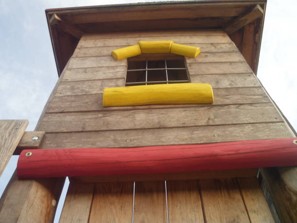 istock Close up multi colored public playground castle toy for climbing and sliding 1021378106