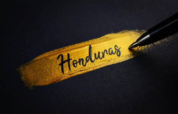 istock Honduras Handwriting Text on Golden Paint Brush Stroke 1021383244