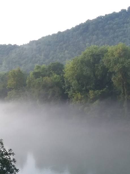 istock Fog Rising On Water Tennessee Bridge 1021395252