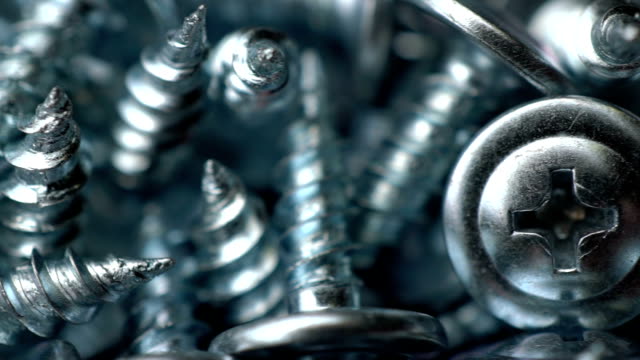 many self tapping screws rotate motion background