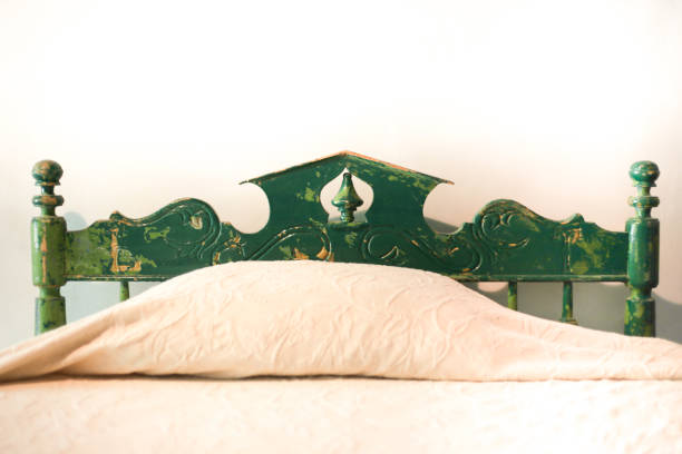 Antique Green Wooden Bedframe and Bedspread