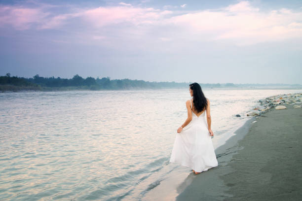 istock A woman is at the river 1021445258