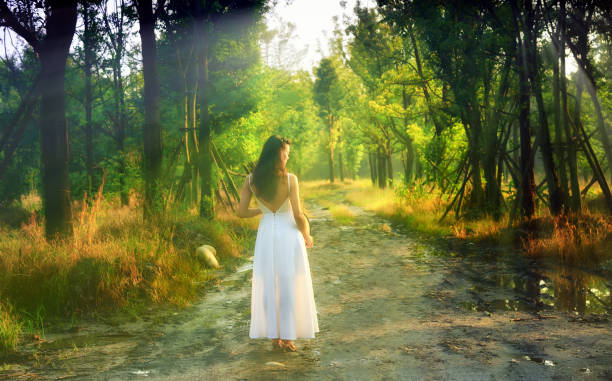 istock The woman in the forest 1021445330