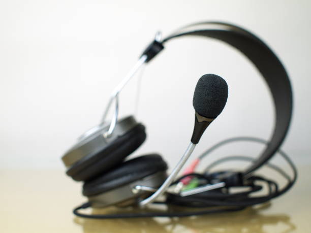 istock headset, focus on microphone, shallow depth of field 1021476370