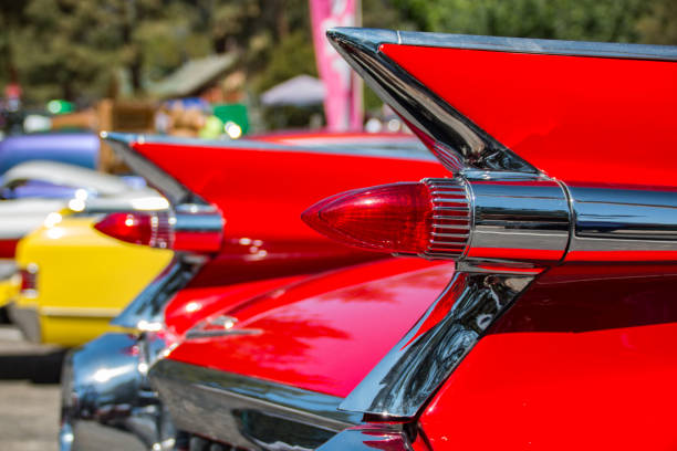 End Network The classic styling of a 1959 Cadillac, with tail fins and bullet taillights. car show stock pictures, royalty-free photos & images
