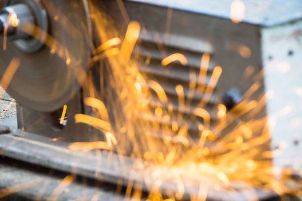 istock Work with steel pipe on the old cutting machine 1021505112