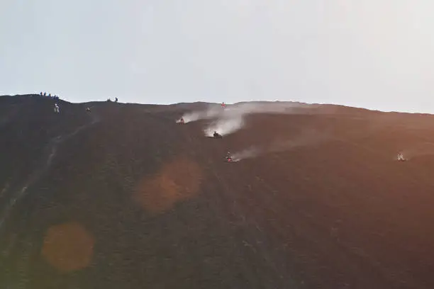 Photo of People doing volcano boarding