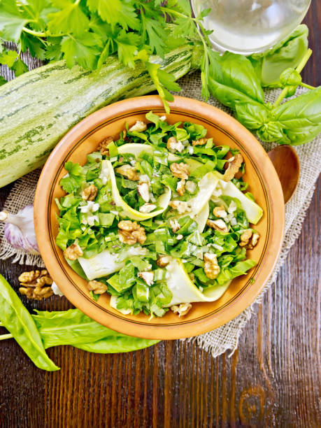 istock Salad with squash and sorrel on dark board top 1021505388