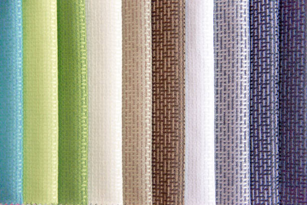 Classic interior details , beige and brown coloured windows curtains.