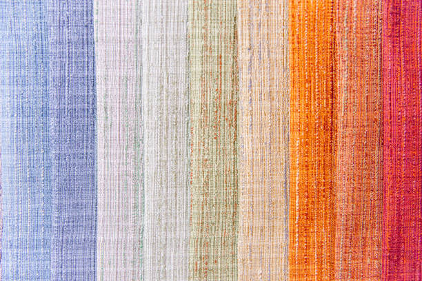 Rolls of colorful fabric and textiles in a shop or store