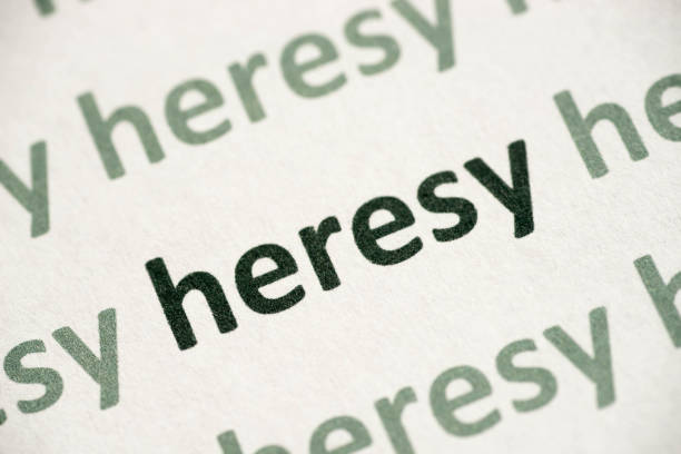 istock word heresy printed on paper macro 1021526252