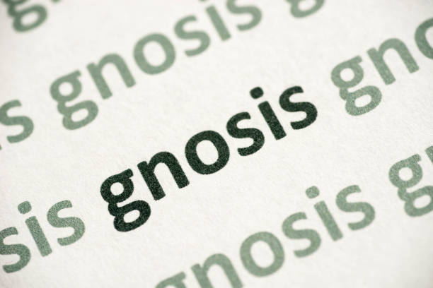 istock word gnosis printed on paper macro 1021526376