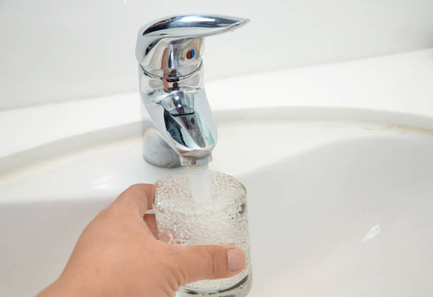 istock Filling glass of water 1021526730