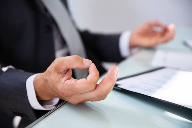 istock Businessman Meditating In Office 1021542806