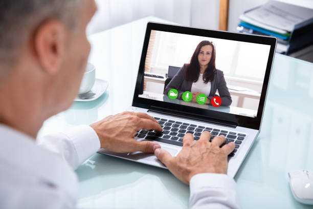 istock Businessman Videoconferencing With Colleague On Laptop 1021543008