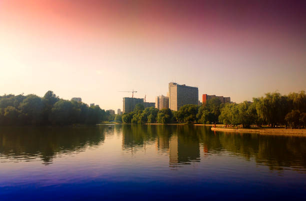 istock Sunset city park background 1021543434
