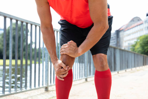 istock Jogger Having Pain In His Knee 1021543900