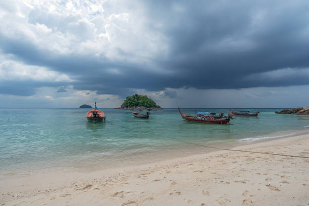 View Of Sandy Beach And Stormy Clouds