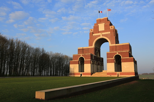 The Thiepval Memorial in Flanders, Belgium at sunrise. This is the memorial with over 72000 names of missing British and South African servicemen who died in the Battles of the Somme of the First World War between 1915 and 1918, with no known grave.