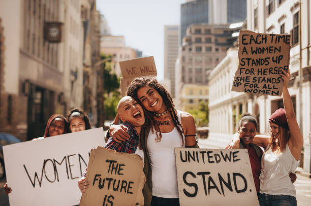 istock Girls having fun at women's march 1021562658