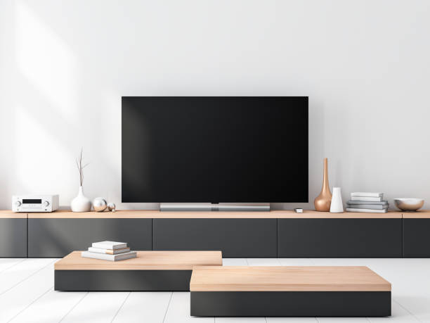 istock Smart Tv set Mockup standing on wooden console 1021563284