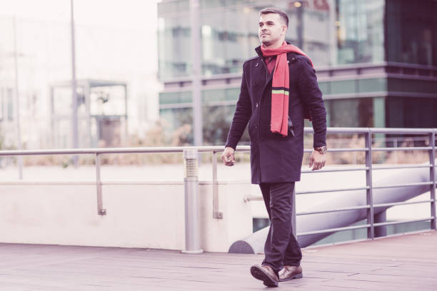 istock Confident businessman walking along transition 1021568702