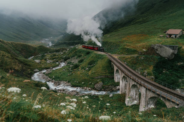 Scenic view of steam locomotive in Furka Pass, Switzerland