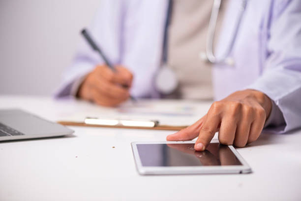 istock Docter and stethoscope on white table,health care concept 1021577050