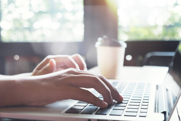 istock Girl hands working on her laptop 1021577484