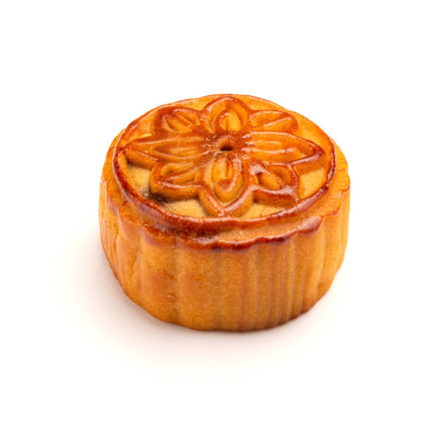 istock side view studio shoot of traditional Chinese mooncake on white 1021583156
