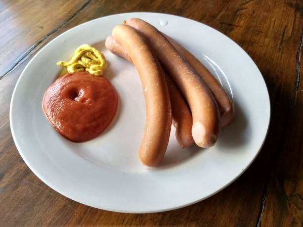 istock Sausages with mustard and ketchup 1021583710