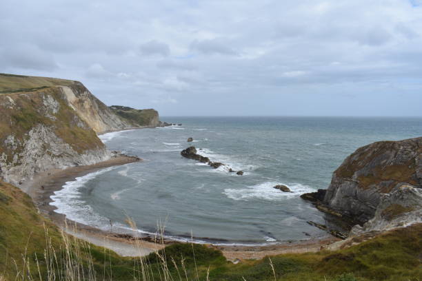 istock Durdle Door bay in Dorset, England 1021583804