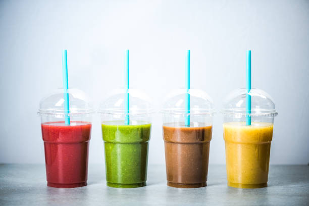 istock Healthy diet smoothie in four colors 1021586872