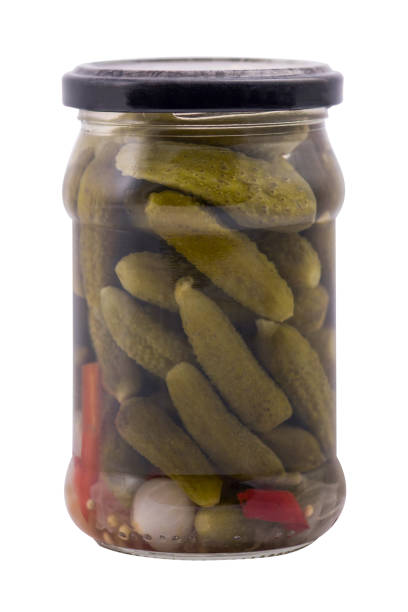 istock Jar with preserved food  cucumber,, isolated on white 1021589390