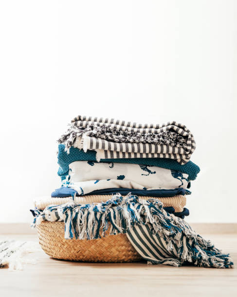 istock Basket with blue and beige laundry 1021593586