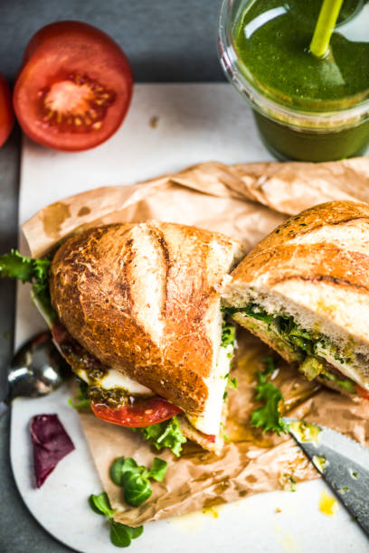 istock tomato, mozarella and pesto sandwich 1021593758