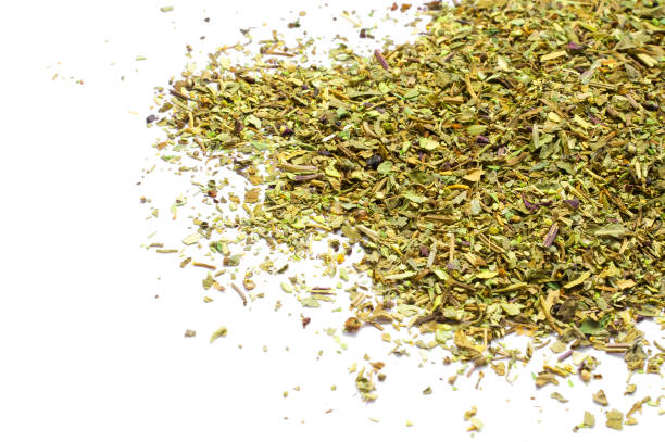 istock Dried crushed basil leaves isolated on white 1021599414