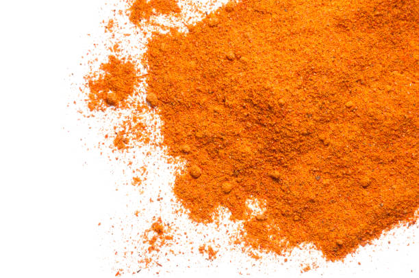 istock Cayenne ground pepper isolated on white. 1021599436