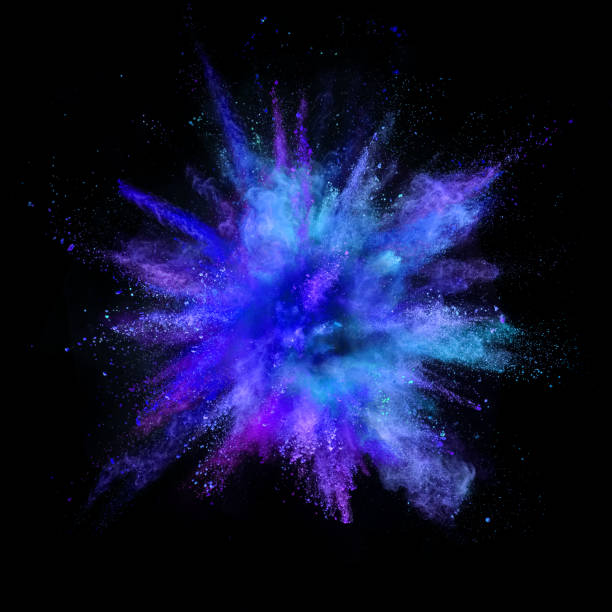 istock Explosion of coloured powder isolated on black background. 1021608438