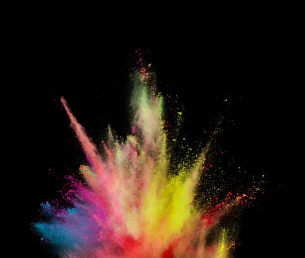 istock Explosion of coloured powder isolated on black background. 1021608470
